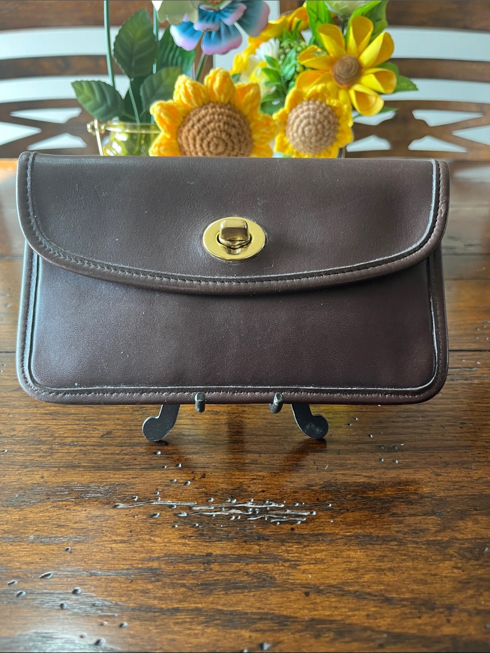 Coach vintage women’s Dark Brown Leather Clutch Wallet with Turn-Lock closure.